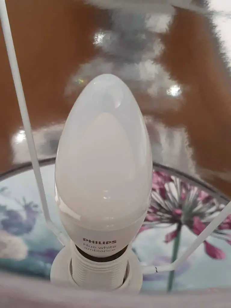 A Philips Hue White Ambiance candle bulb