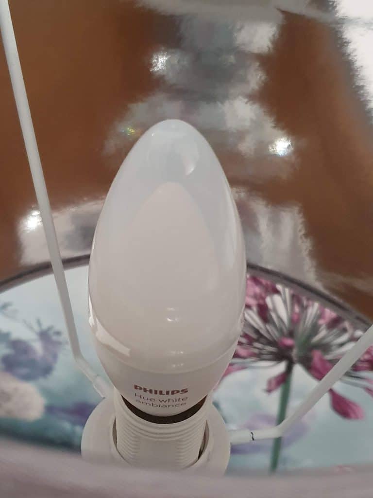 A Philips Hue White Ambiance candle bulb