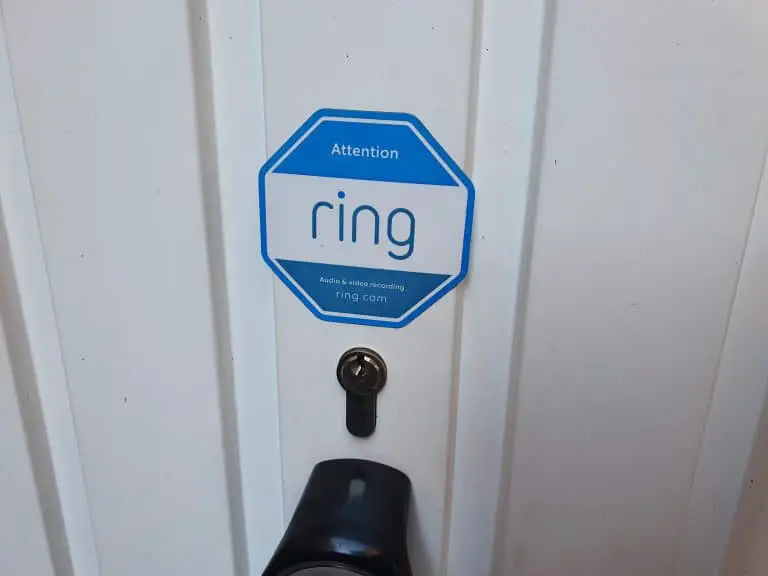 A Protected By Ring warning and information sticker