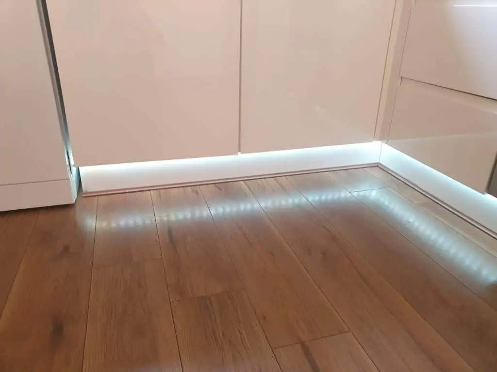 A smart ZigBee based LED light strip mouned below my kitchen cabinets