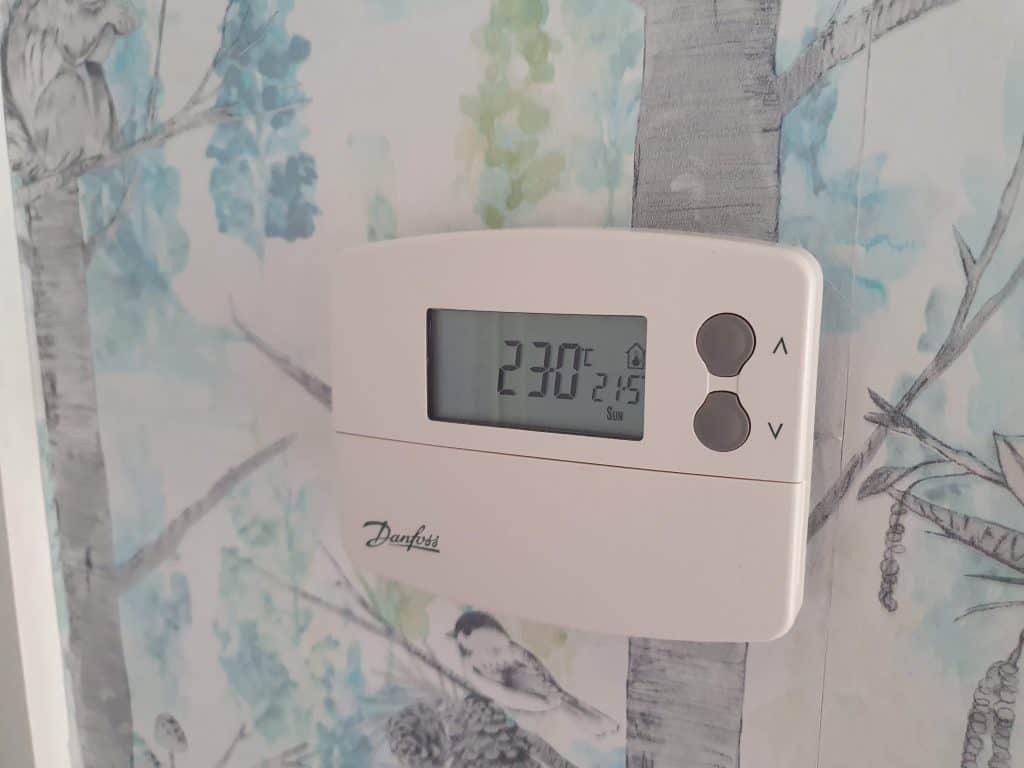 A traditional non smart wall thermostat